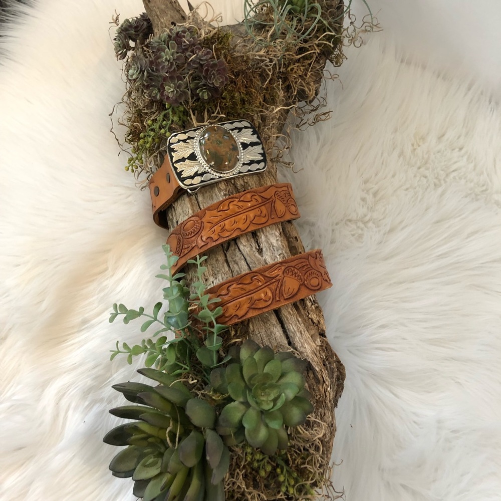 Vintage Western buckle and leather belt.